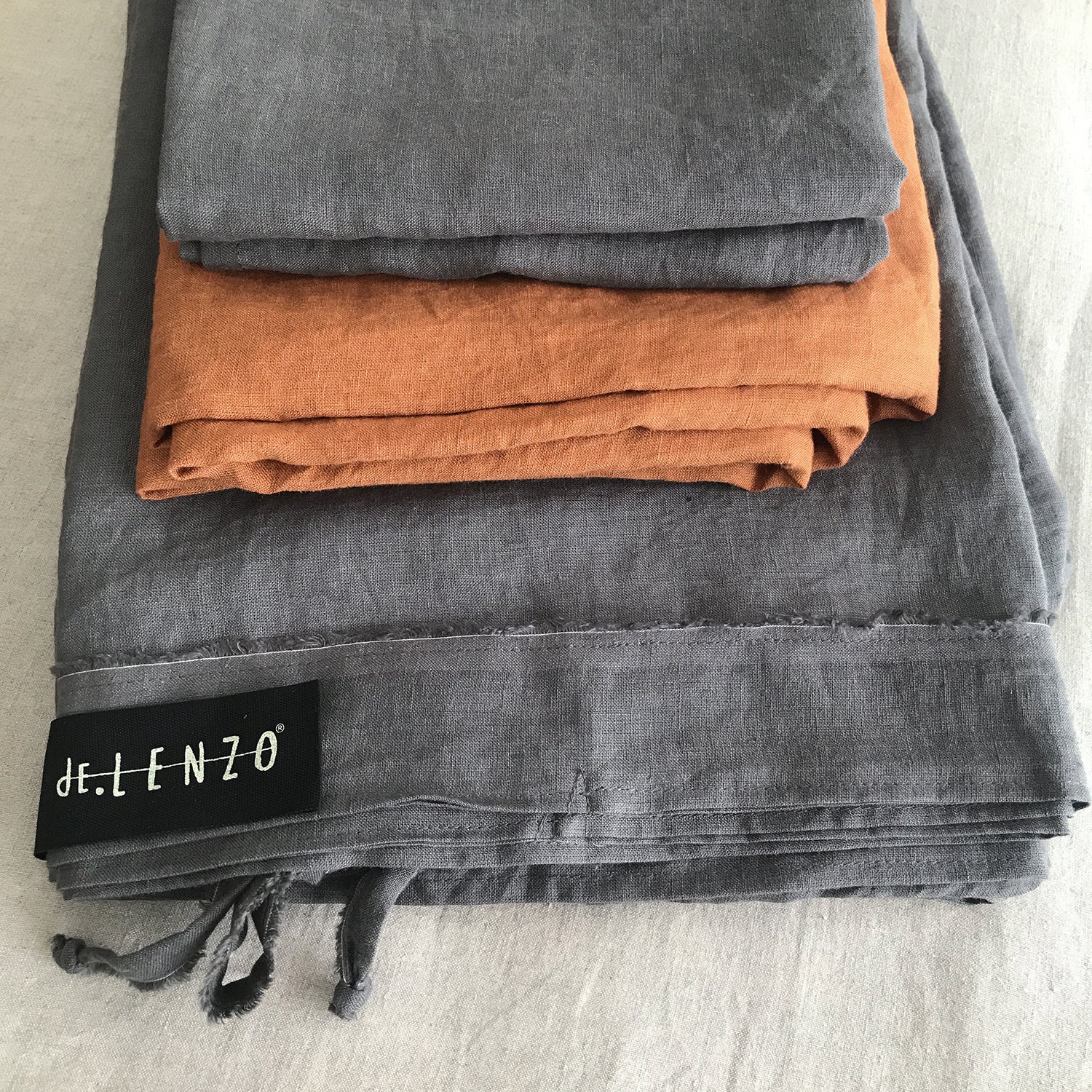 Funda nórdica lino GRIS y bajera teja.