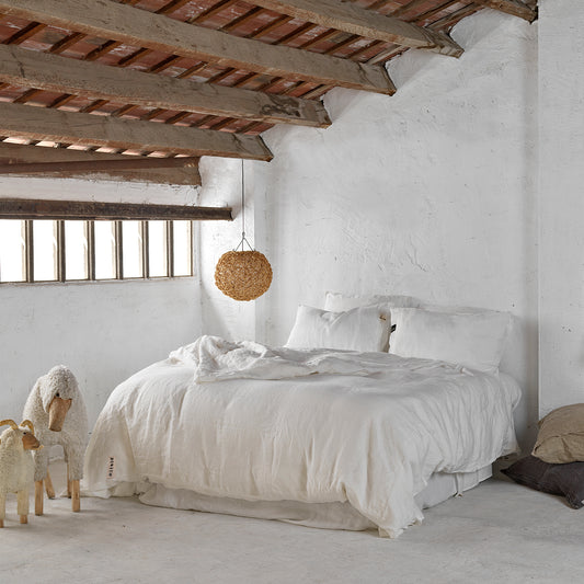 Juego completo de lino blanco. Funda nórdica, bajera y almohadas.