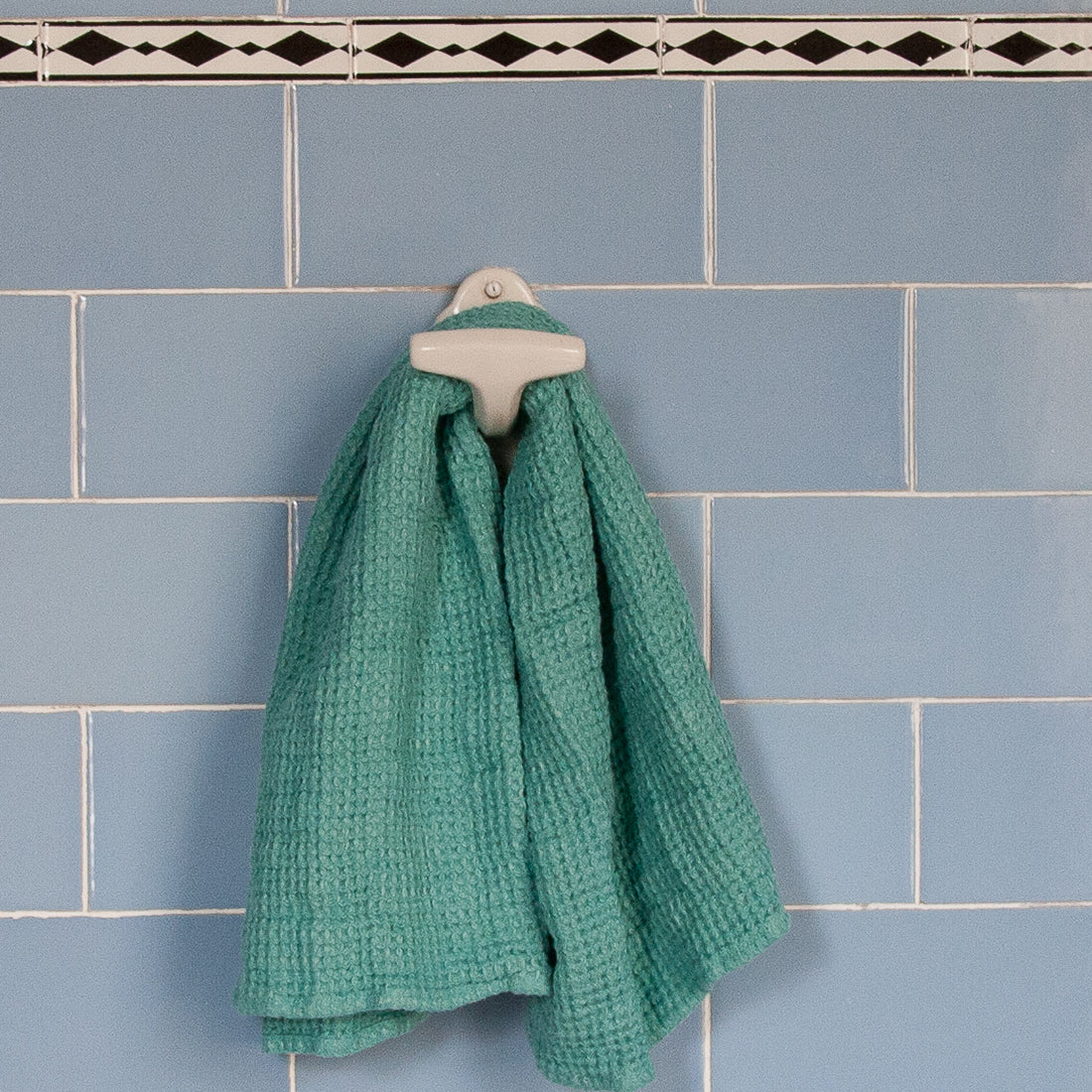 Toalla verde de lino gofre